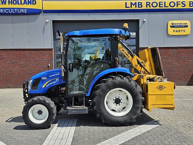 New Holland Boomer 3050 met Bos Maaiarm