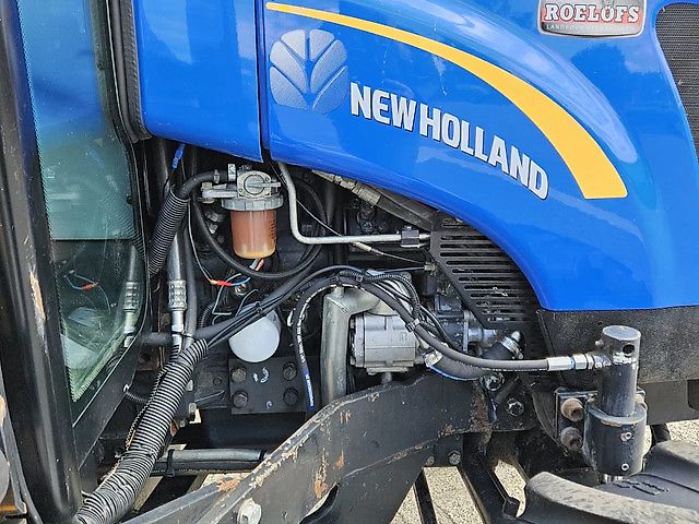 New Holland Boomer 3050 met Bos Maaiarm